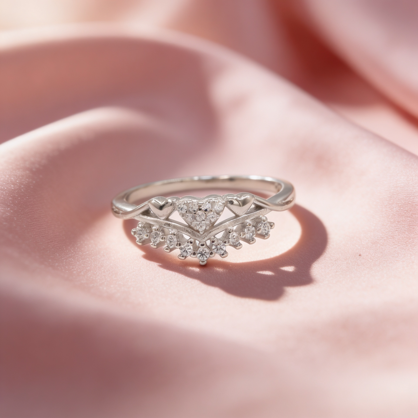 Aarika 925 silver tiara heart ring for women by Zyrene on pink satin background