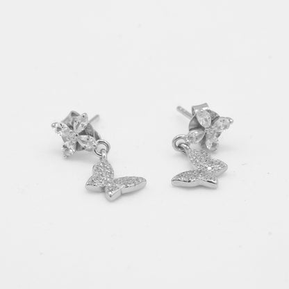 Side view of Zyrene butterfly drop earrings in 925 sterling silver