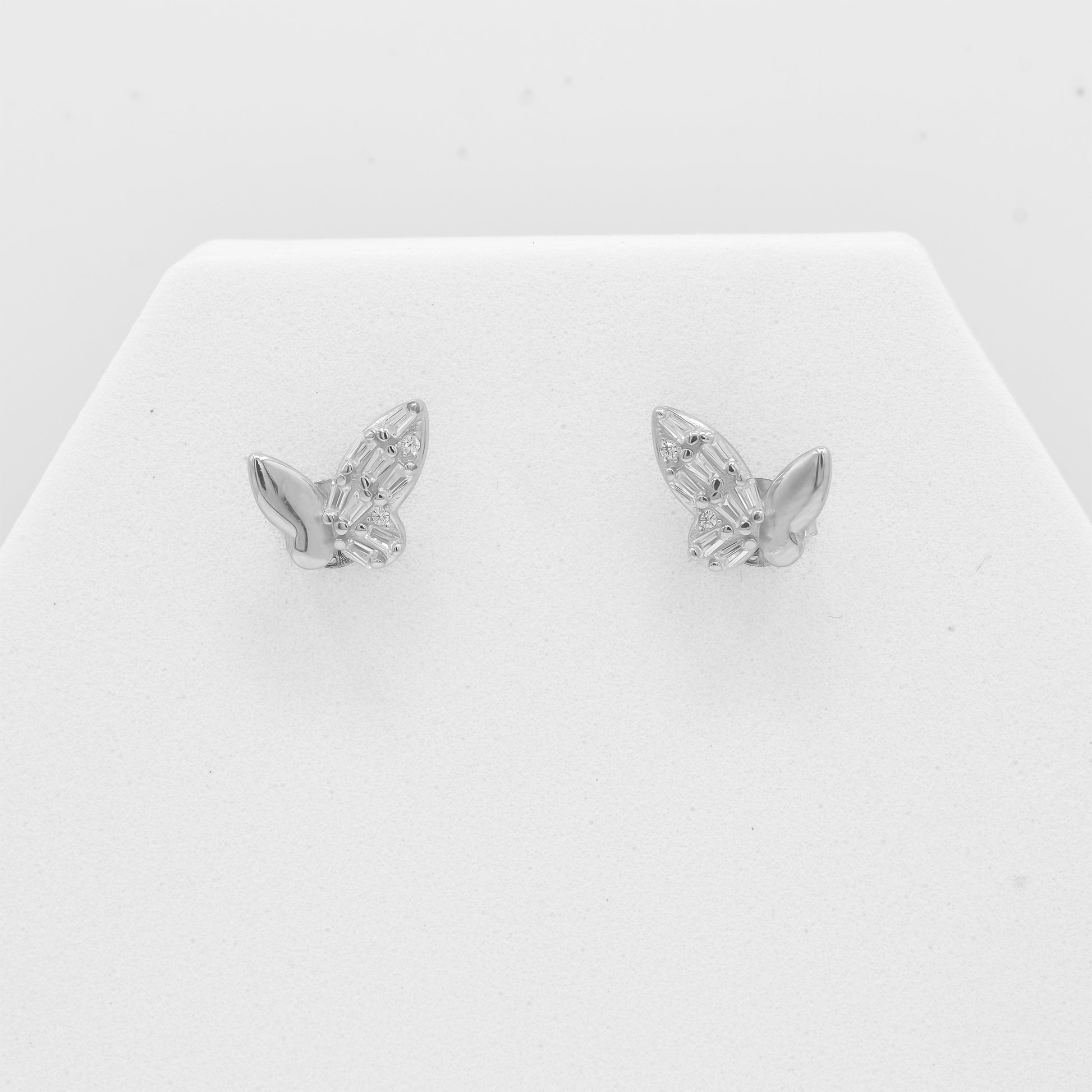 Close-up of Zyrene 925 silver butterfly earrings with crystal wing detailing