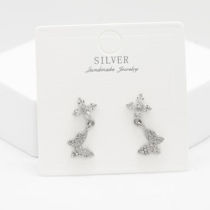 Front view of 925 silver floral butterfly earrings for women by Zyrene