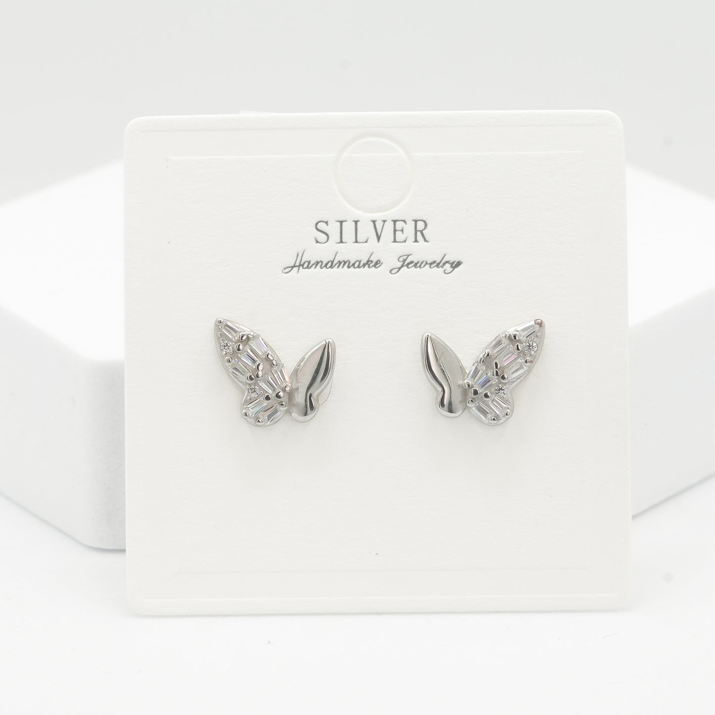 Front view of 925 silver crystal butterfly earrings for women by Zyrene