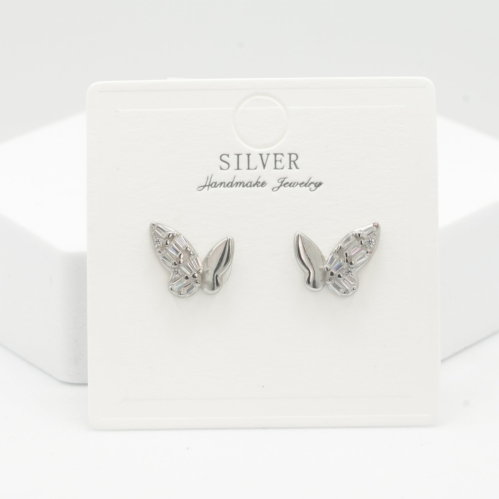 Front view of 925 silver crystal butterfly earrings for women by Zyrene