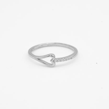 Close-up of Ira 925 silver open heart ring with sparkle stone detailing