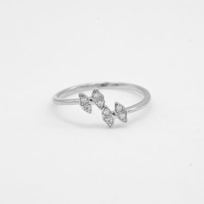 Close-up of Kyra 925 silver double butterfly ring with sparkle stone detailing