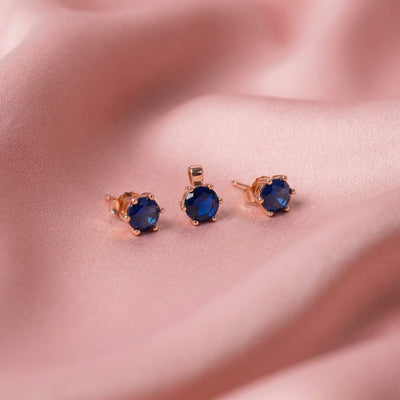 Blueluxe™ by Zyrene – Sapphire Solitaire Pendant & Earrings Set | 18K Rose Gold Finish | Timeless Minimal Elegance
