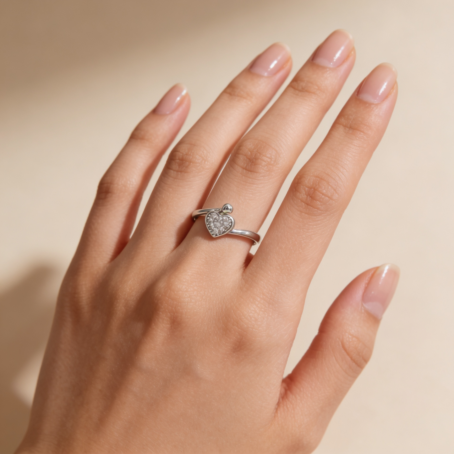 Zyrene Cora 925 silver heart ring worn on hand for everyday styling
