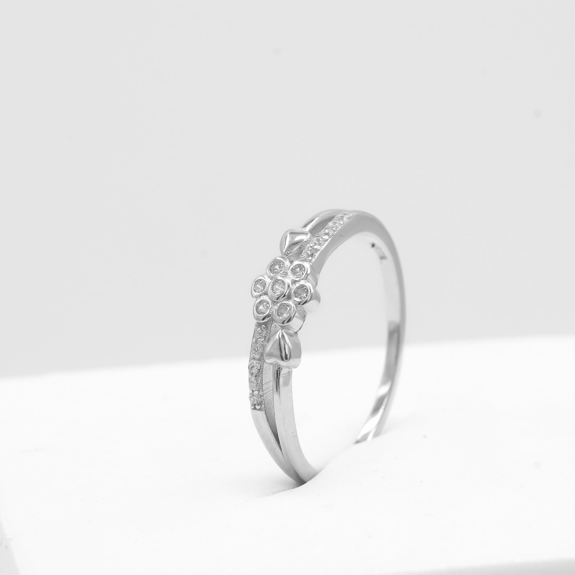 Front view of Myra flower heart ring in 925 sterling silver by Zyrene