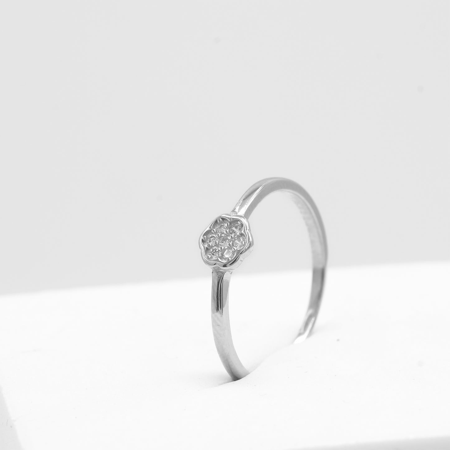Front view of Nira flower sparkle ring in 925 sterling silver by Zyrene