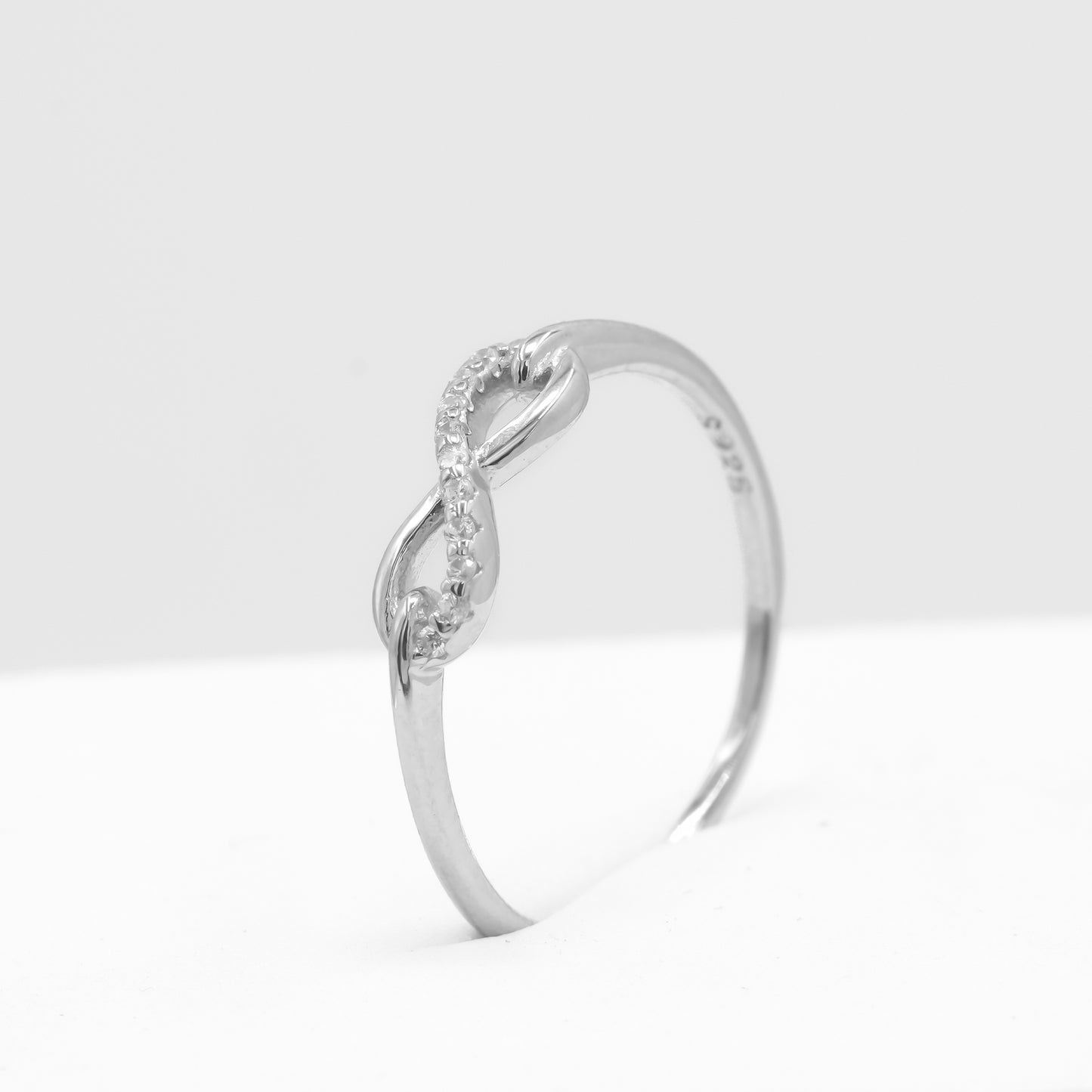 Front view of Noor infinity loop ring in 925 sterling silver by Zyrene