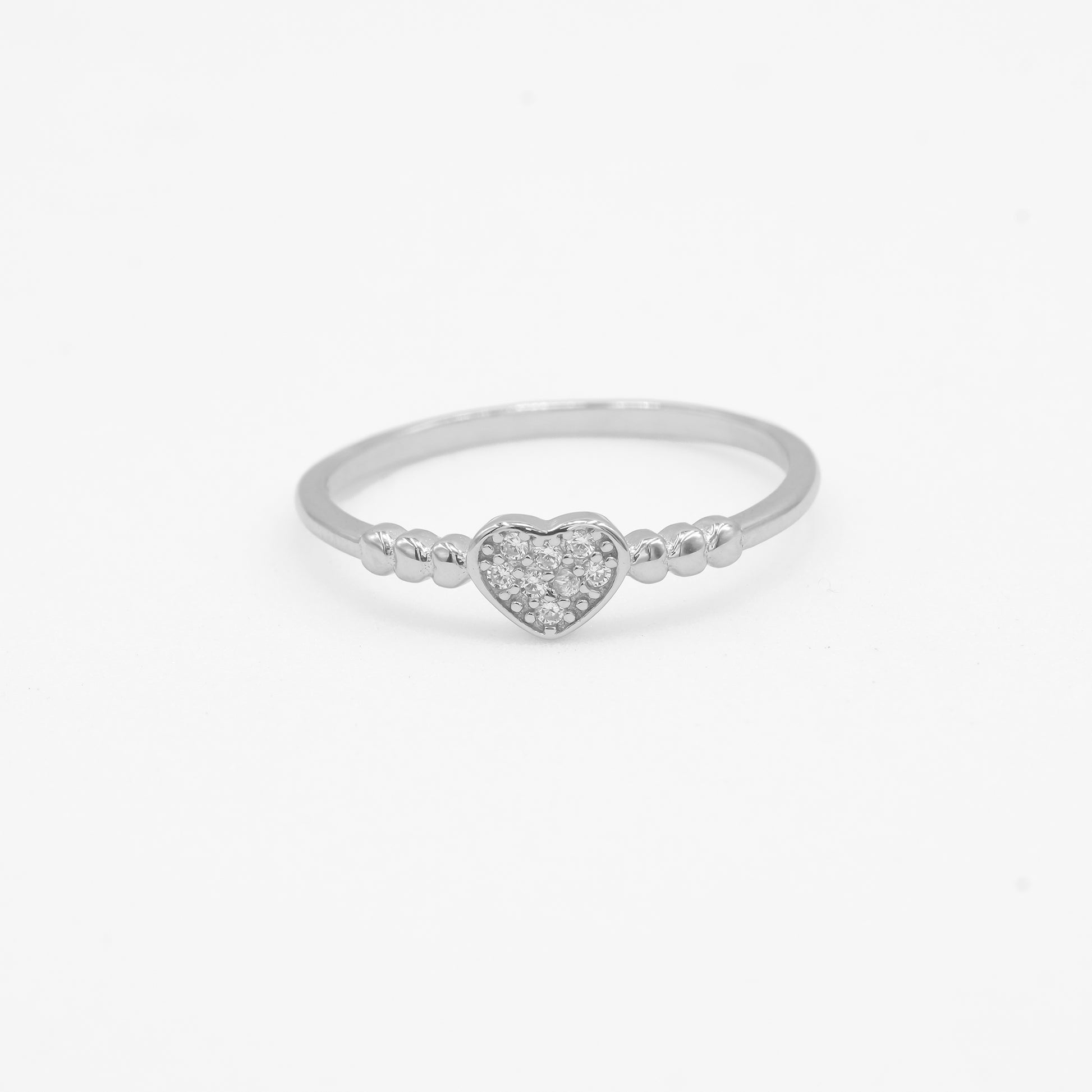 Close-up of Siya 925 silver beaded heart ring with sparkle stone detailing