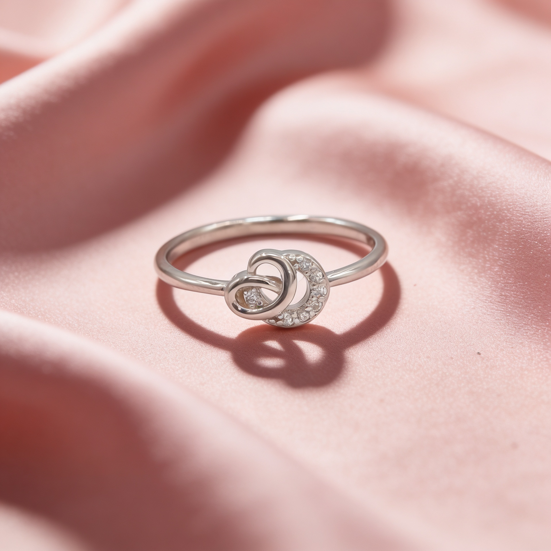 Mira 925 silver circle bond ring for women by Zyrene on pink satin background