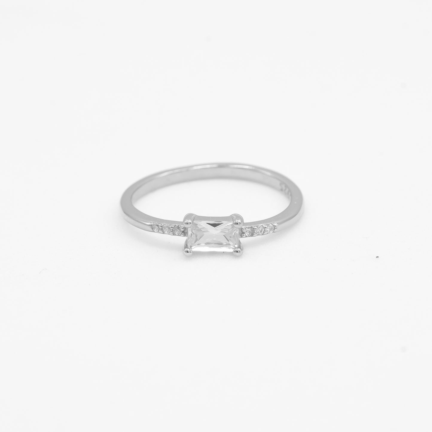 Close-up of Mishka 925 silver solitaire ring with rectangular centre stone detailing