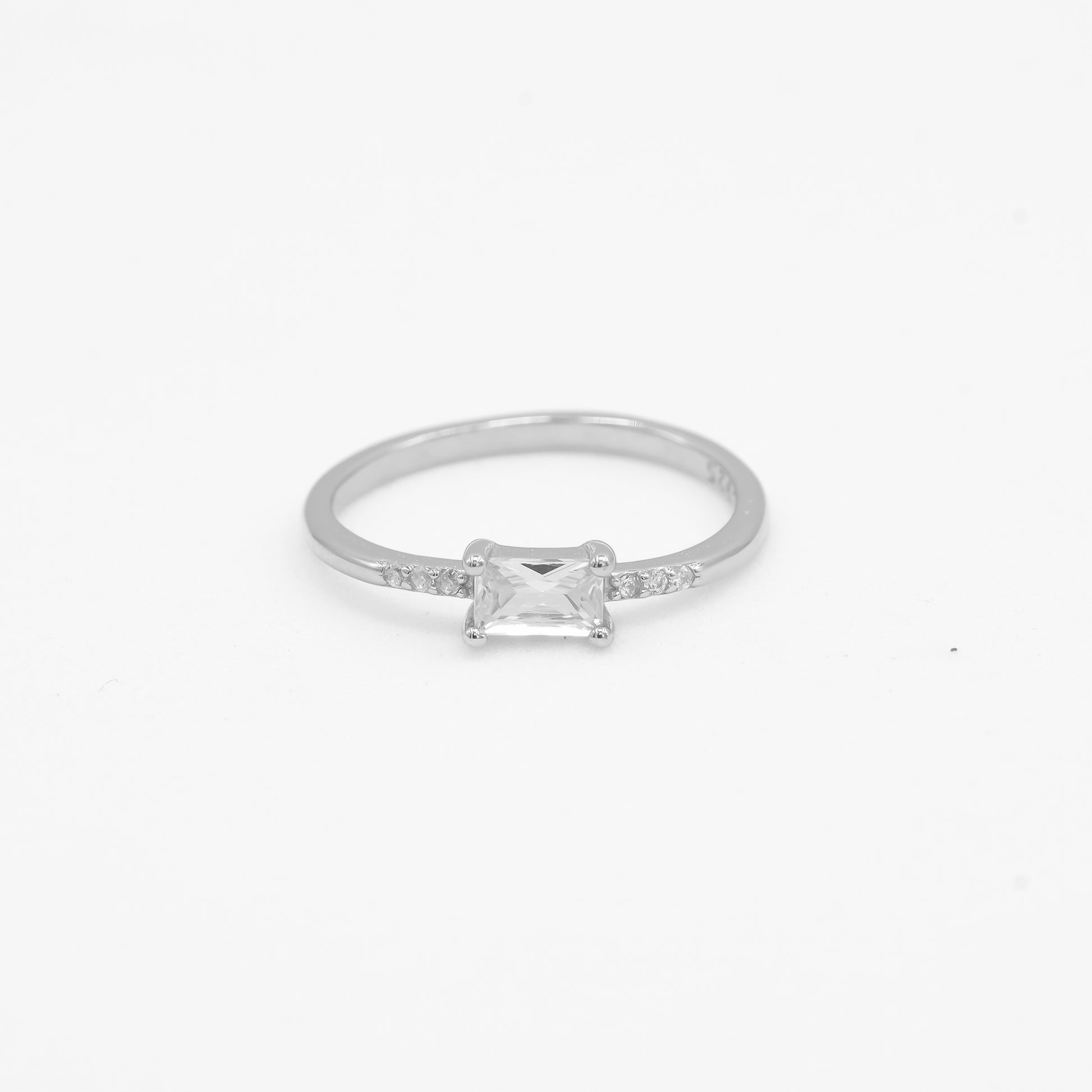 Close-up of Mishka 925 silver solitaire ring with rectangular centre stone detailing