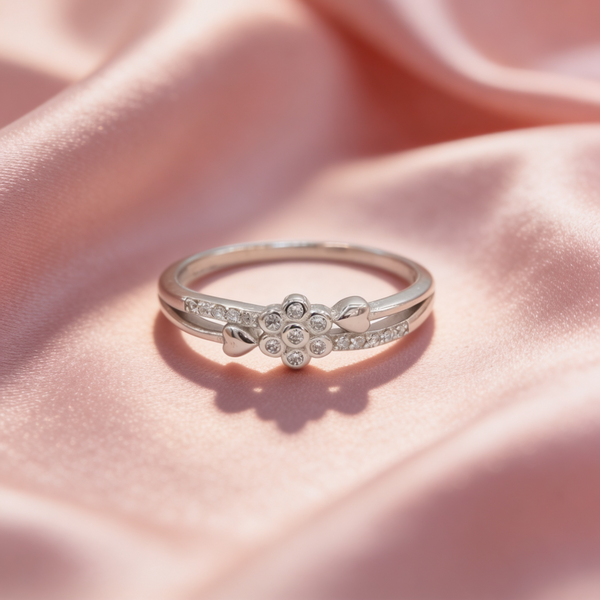 Myra 925 silver flower heart ring for women by Zyrene on pink satin background