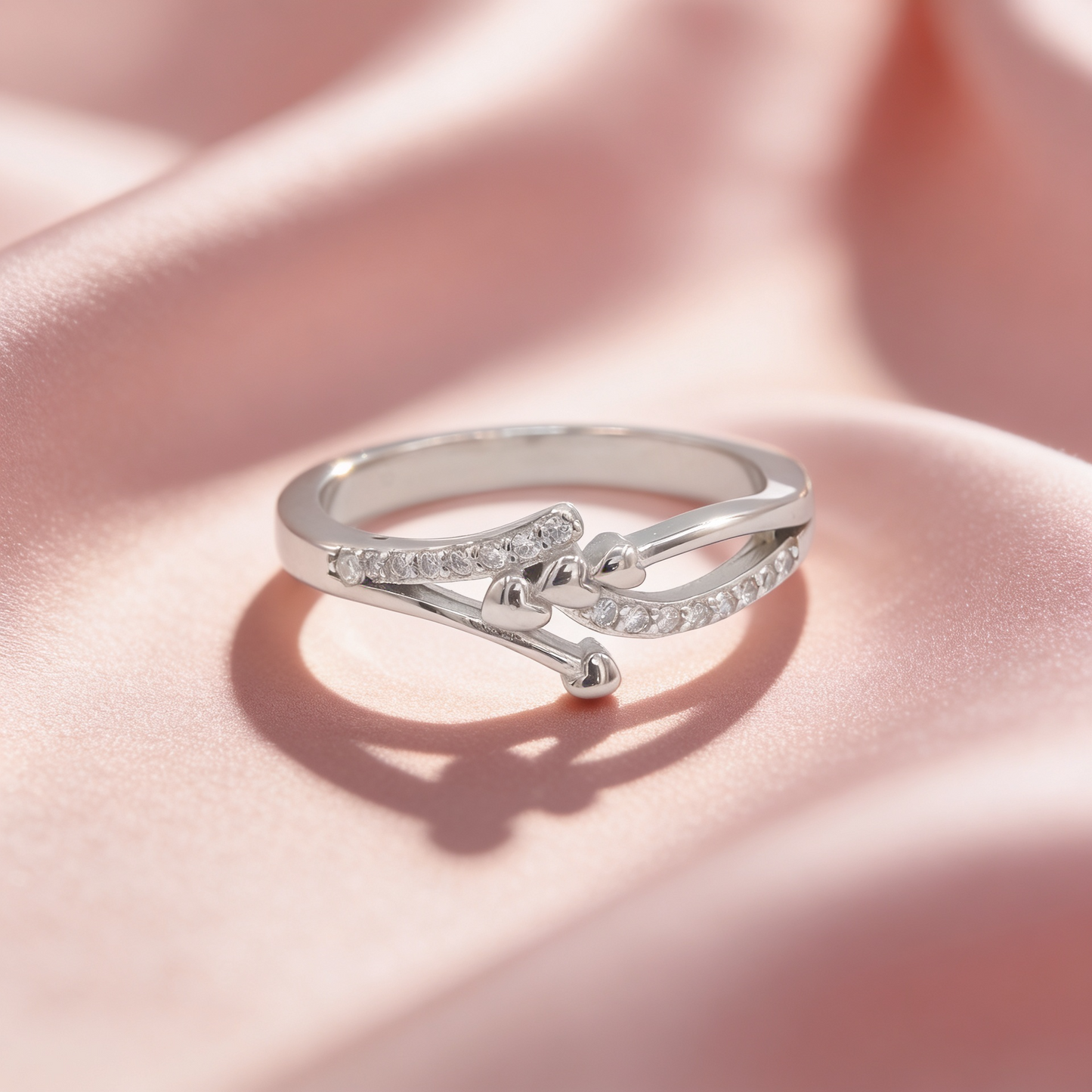 Reva 925 silver heartline ring for women by Zyrene on pink satin background
