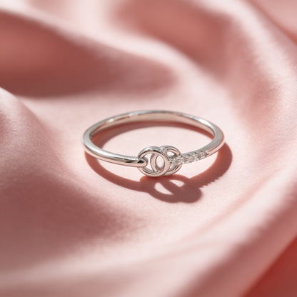 Riva 925 silver linked circle ring for women by Zyrene on pink satin background