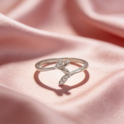 Vanya 925 silver leaf ring for women by Zyrene on pink satin background
