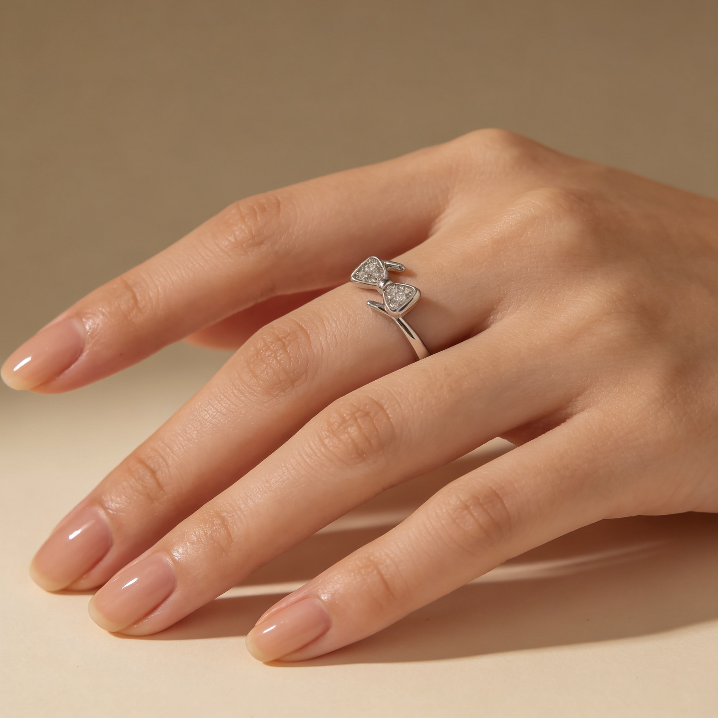 Zyrene Naira 925 silver bow ring worn on hand for daily wear styling