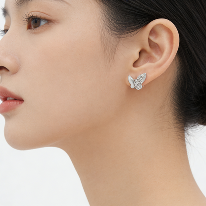 Zyrene 925 silver butterfly stud earrings worn for festive styling